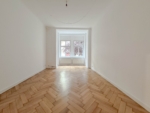 Großzügige Hochparterrewohnung mit Terrasse in Toplage - Wohnzimmer