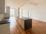 Große und lichtdurchflutete 4 Zimmerwohnung mit Loftcharakter - Wohn-Essbereich